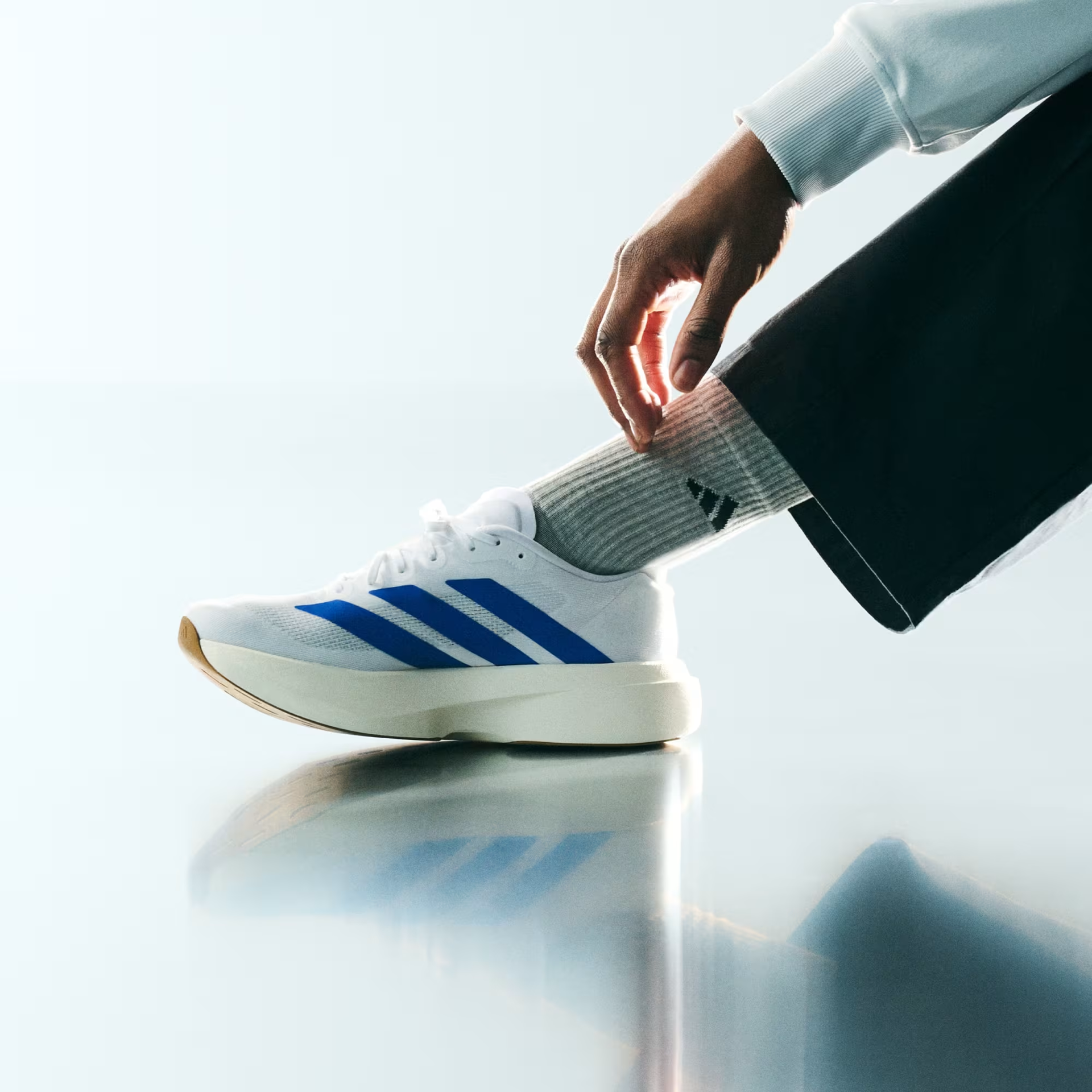 Adidas Men's Adizero Evo SL Shoes in Cloud White/Royal Blue/Pure Ruby